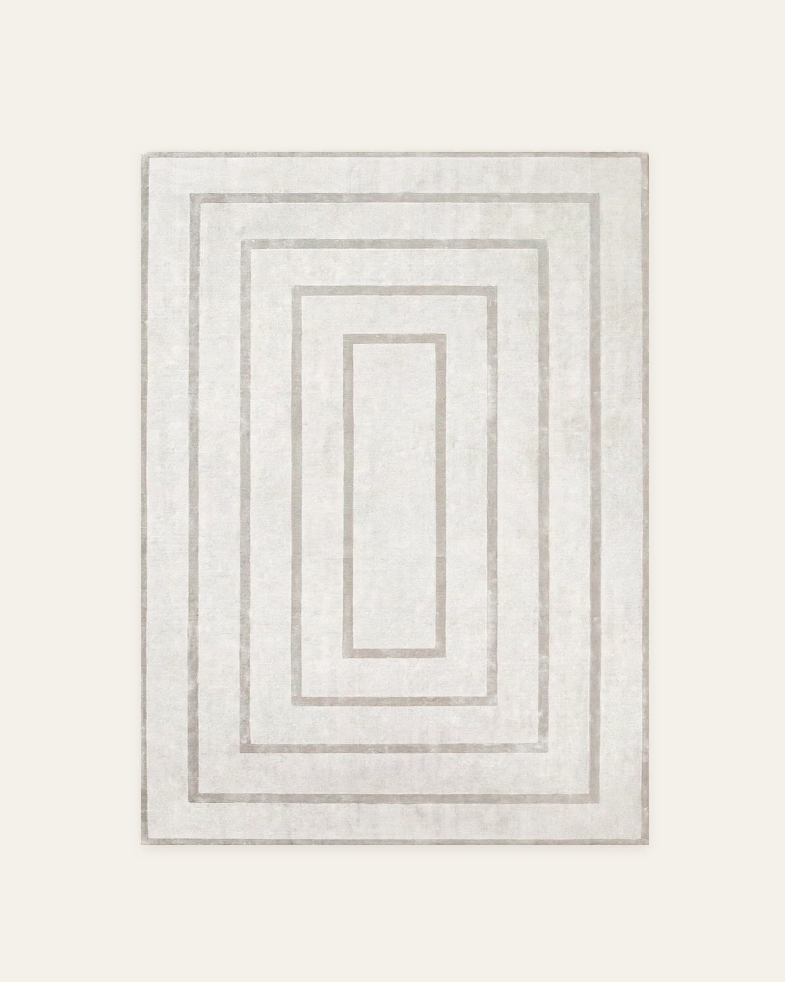 Contour rug, full view: concentric silver-grey rectangles on an ivory field