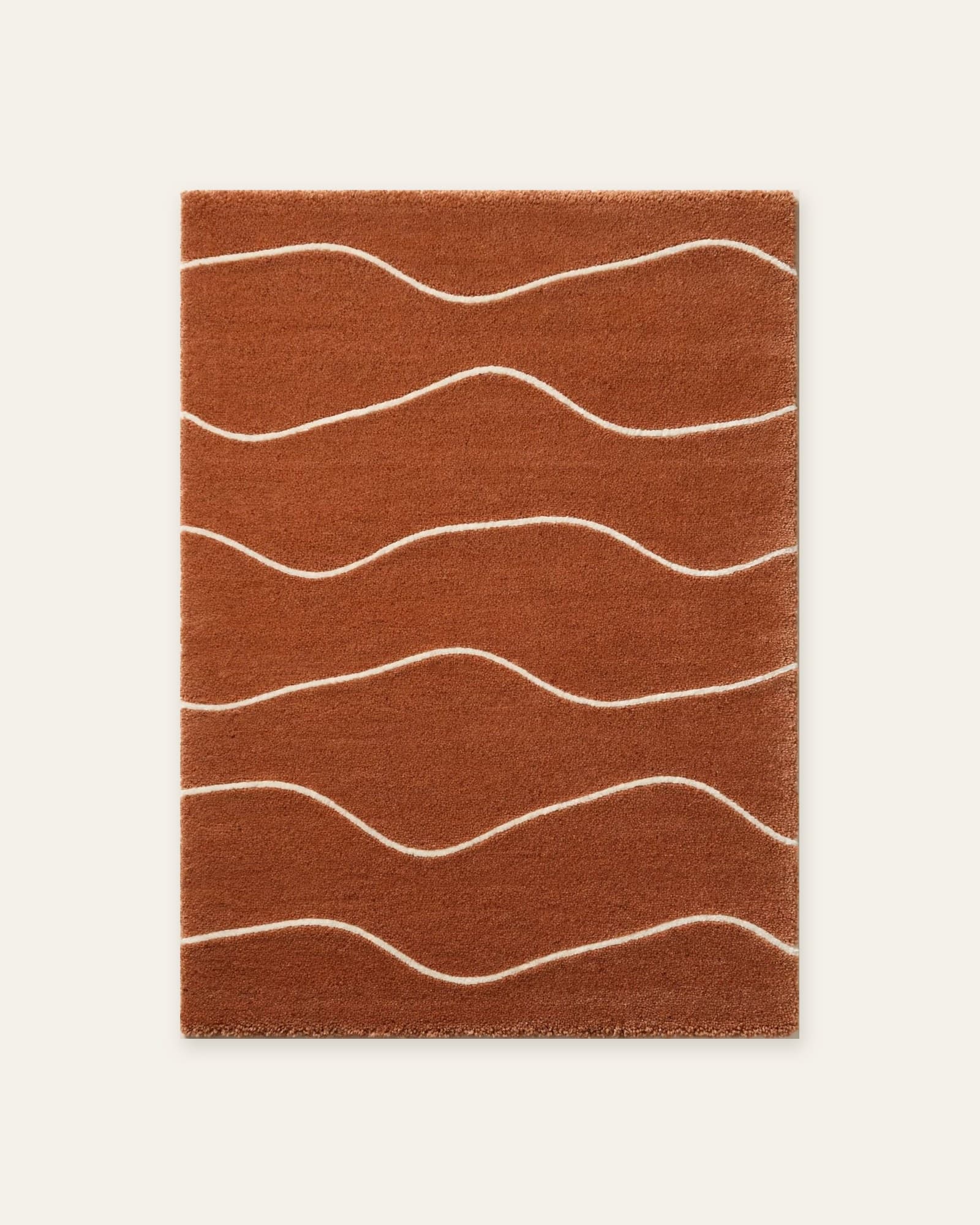 Sienna Tide rug, full view: six wavy ivory lines across a terracotta field