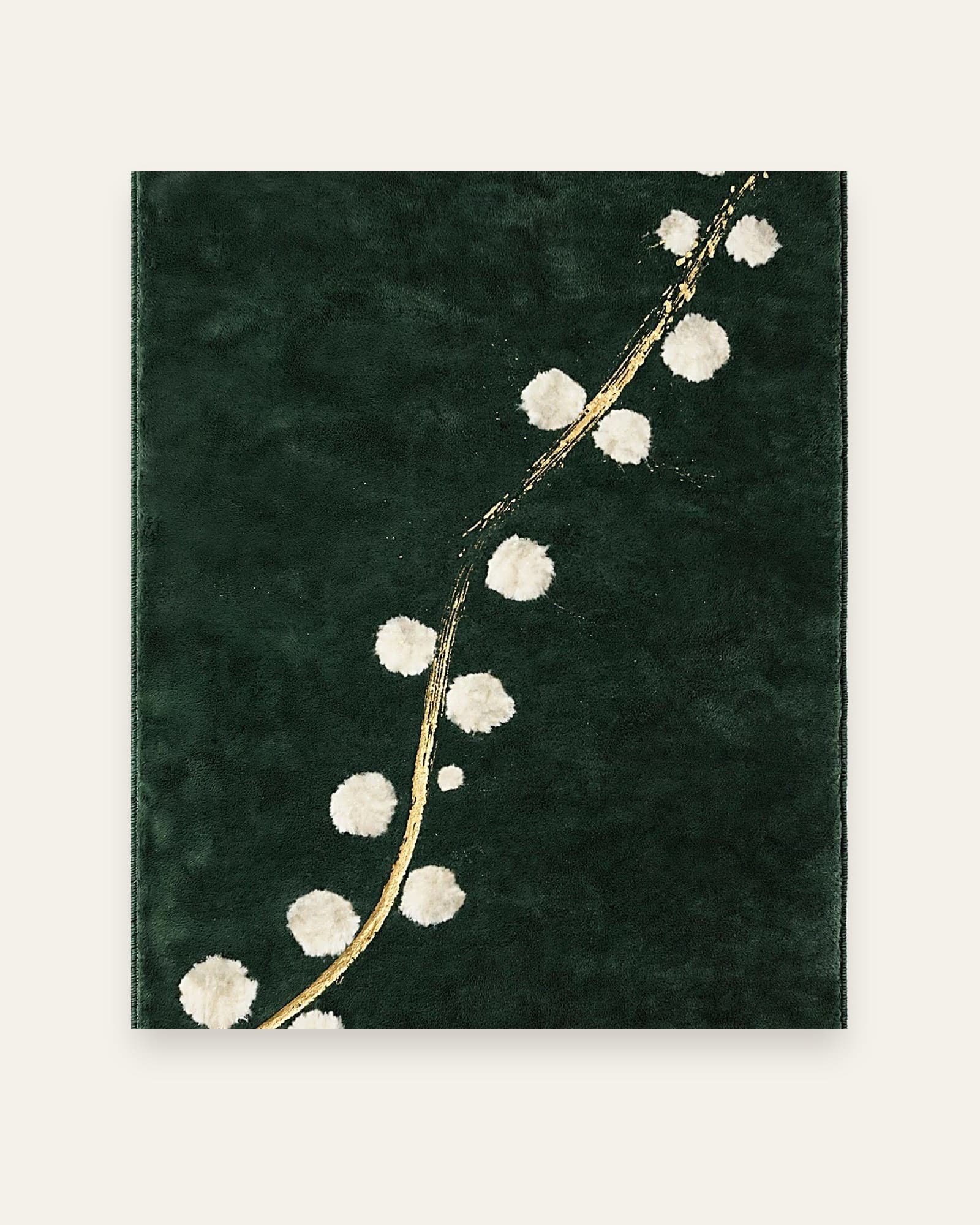 Golden Branch rug, full view: a gold branch with ivory blossoms across a deep green field